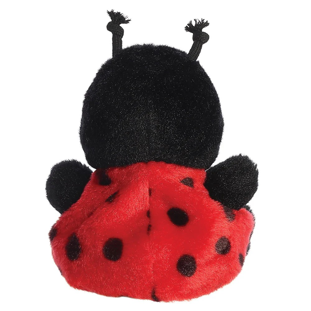 Plush toy ladybug with black and red colors on a white background