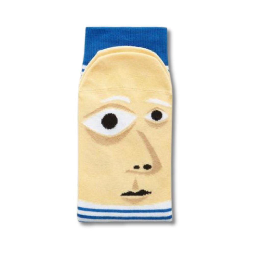 A pair of socks with a playful cartoonish design featuring a stylized face with prominent eyes and a small mouth in a blue and yellow color scheme.