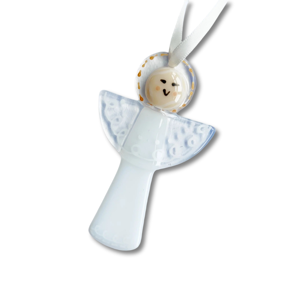 A Christmas angel decoration made of glass, predominantly white in color, with gold accents and a smiling face.