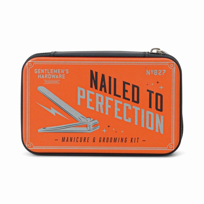 A manicure and grooming kit by Gentlemen's Hardware, featuring a comb, file, scissors, and clippers in a vibrant orange zip pouch with a fabric lining.