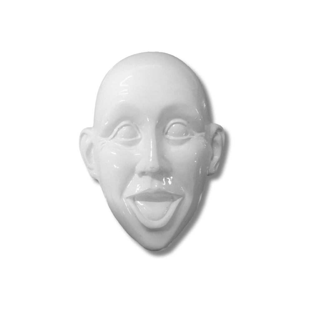 A white magnet in the shape of a stylized human head with a happy expression.
