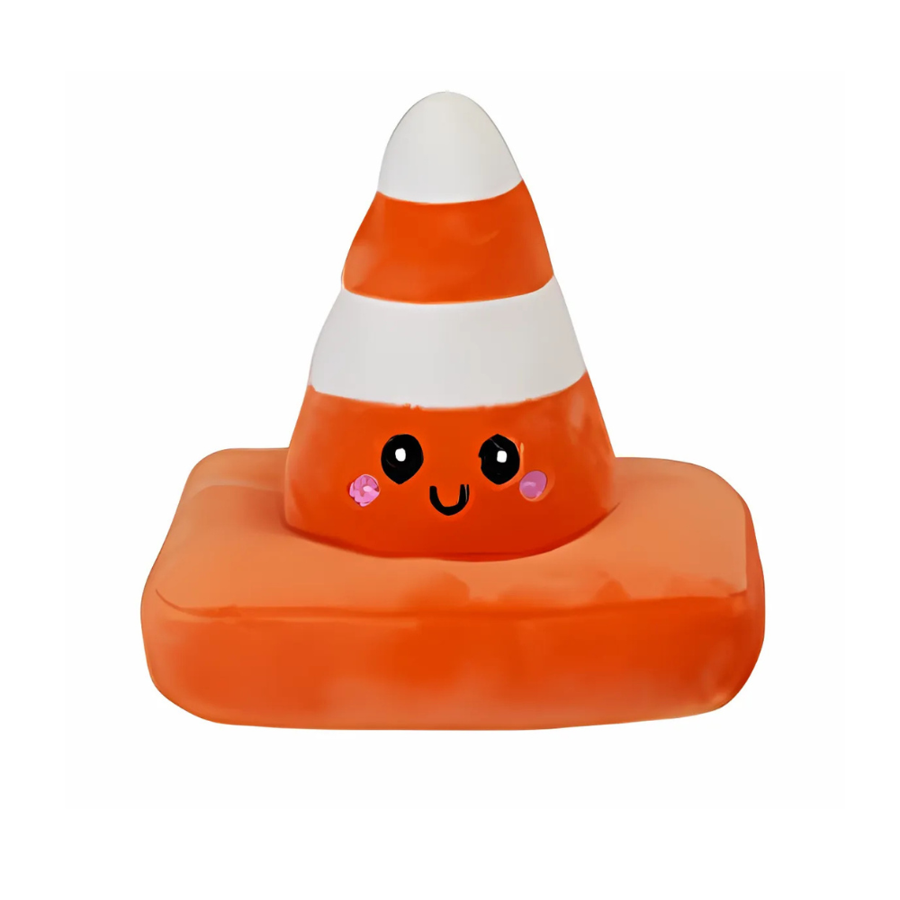 A soft toy in the shape of a traffic cone with an animated face on it, primarily orange with a white stripe.