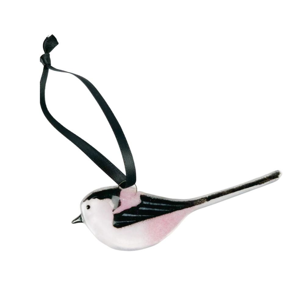 Decorative bird ornament with a black ribbon on a white background