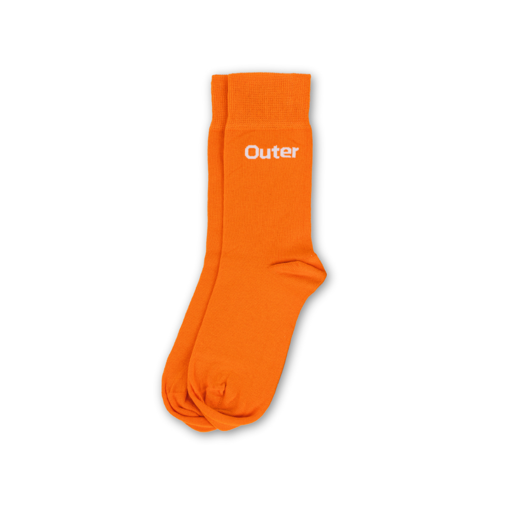 A pair of orange socks with the word 'Outer' written on the side.