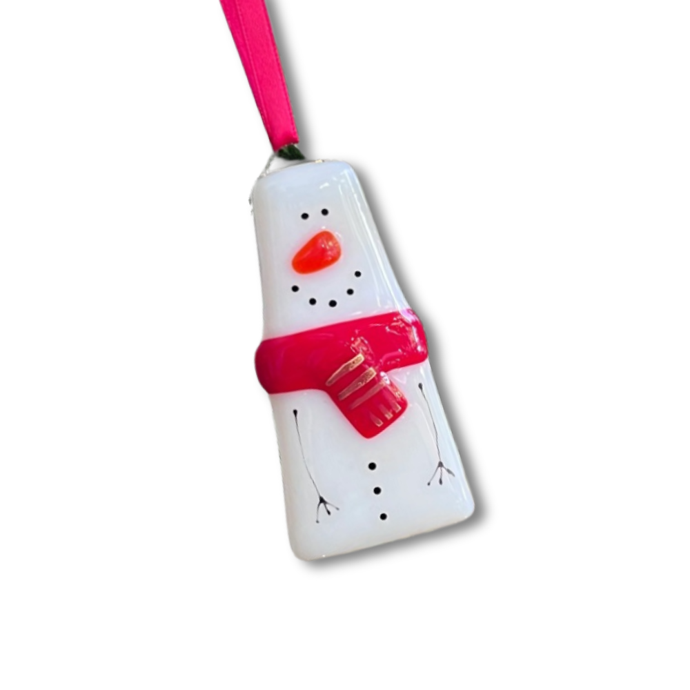 A handcrafted glass snowman decoration with metallic details and a red satin ribbon.