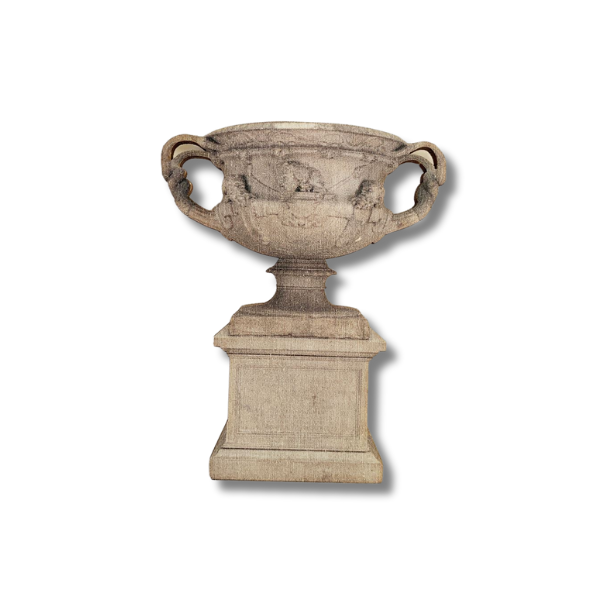 A wooden magnet shaped like the Warwick Vase on display at The Burrell Collection.