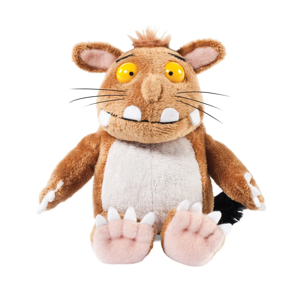 A soft toy representing 'The Gruffalo's Child', a character with brown and white coloring, wearing a felt Stick Man in its hand.
