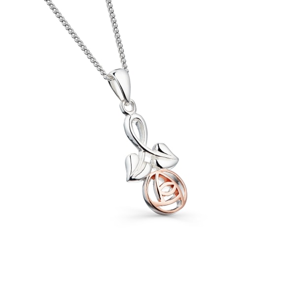 A sterling silver necklace with a rose gold rose and leaves pendant, featuring a silver chain.