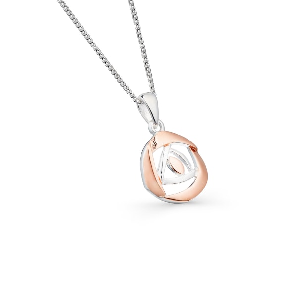 A sterling silver and rose gold plated rose pendant with a silver chain.